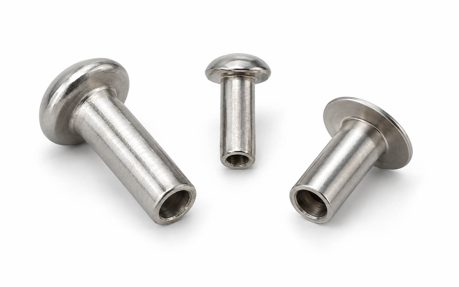 Stainless steel semi-tubular rivets with hollow setting ends